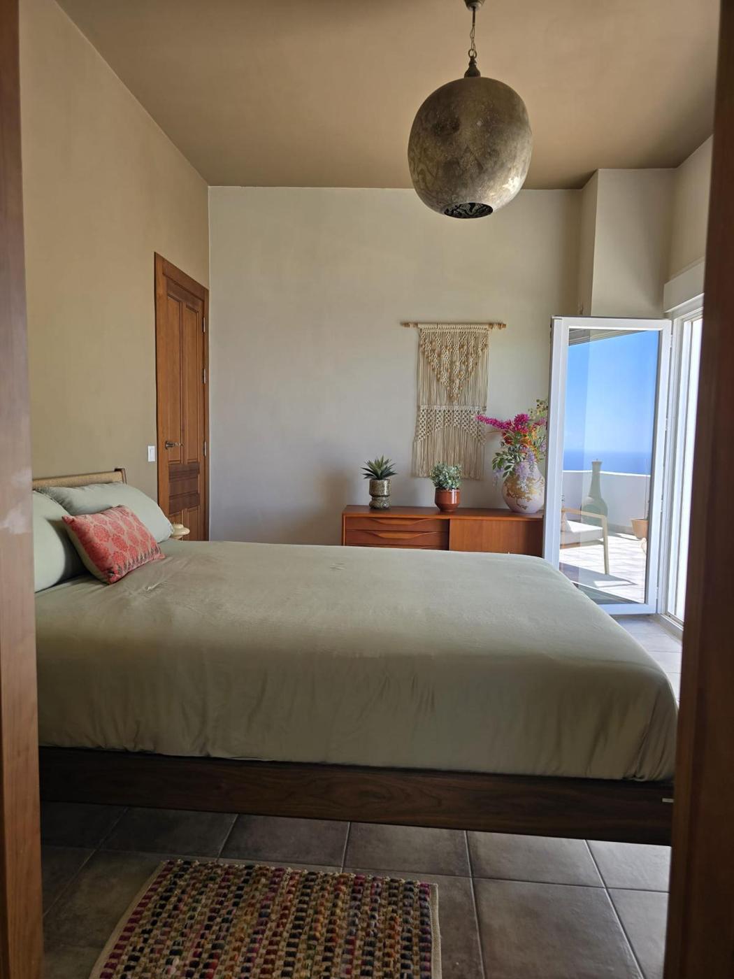 Bedroom with French doors to the terrace